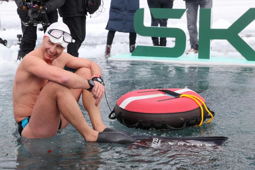 David Vencl reacts after his successful 170-foot dive under the ice of Lake Sils on March 14, 2023.