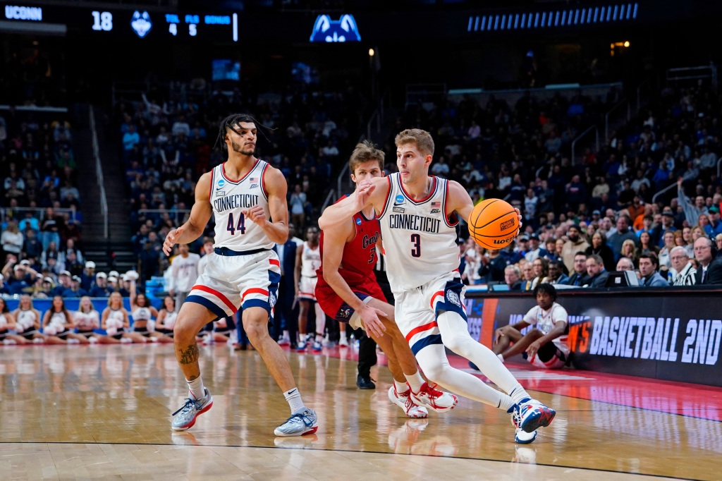 UConn Huskies guard Joey Calcaterra (3) dribbles the ball against the St. Mary's Gaels during the first half at MVP Arena.