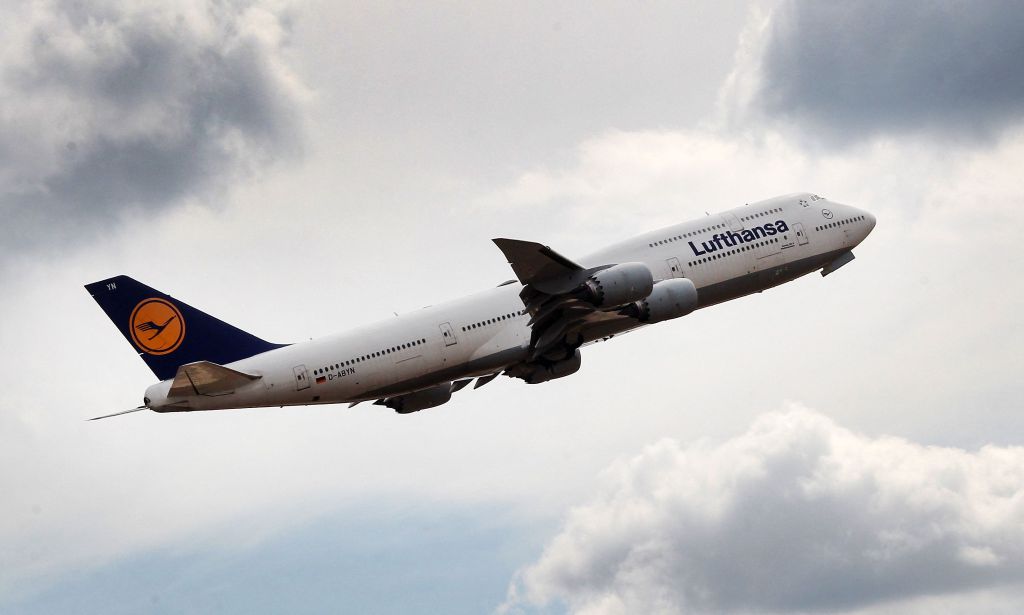 A Lufthansa jet takes off at Frankfurt International Airport.