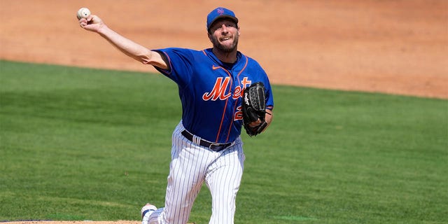 New York Mets starting pitcher Max Scherzer throws during the third inning of a spring training baseball game against the Washington Nationals, Friday, March 3, 2023, in Port St. Lucie, Fla. 