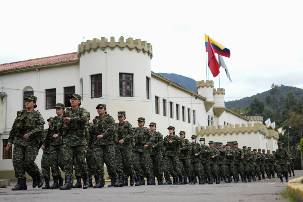 Female voluntary recruits are lined up for training at their military base in Bogota, Colombia on March 6, 2023. 