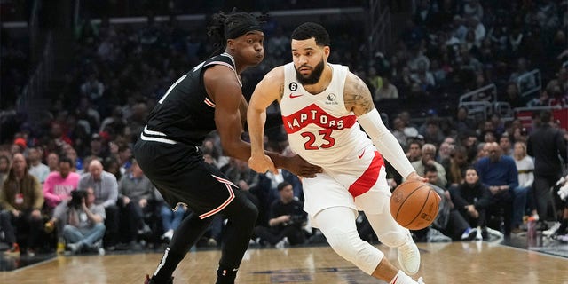 Toronto Raptors' Fred VanVleet, #23, drives past Los Angeles Clippers' Terance Mann, #14, during first half of an NBA basketball game Wednesday, March 8, 2023, in Los Angeles. 