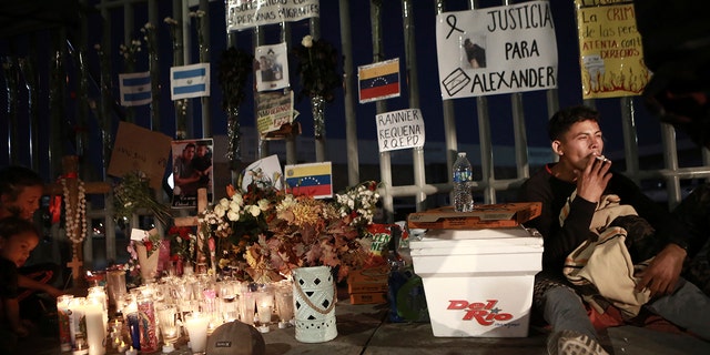 Activists and migrants join a vigil for the victims of a fire at a migration detention center in Ciudad Juarez, Mexico, March 29, 2023.