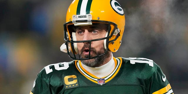 Aaron Rodgers, #12 of the Green Bay Packers, warms up before a game against the Detroit Lions at Lambeau Field on Jan. 8, 2023 in Green Bay, Wisconsin.