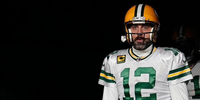 Aaron Rodgers, #12 of the Green Bay Packers, walks onto the field prior to the game against the Tennessee Titans at Lambeau Field on Nov. 17, 2022 in Green Bay, Wisconsin.