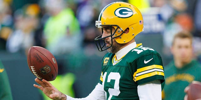 Packers quarterback Aaron Rodgers warms up before the Minnesota Vikings game at Lambeau Field on Jan. 1, 2023, in Green Bay, Wisconsin.