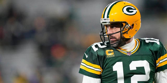 Aaron Rodgers, #12 of the Green Bay Packers, warms up before a game against the Los Angeles Rams at Lambeau Field on Dec. 19, 2022 in Green Bay, Wisconsin.