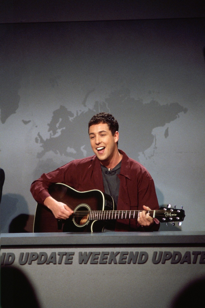 Sandler performing "The Chanukah Song" during "Weekend Update" on SNL on December 3, 1994.