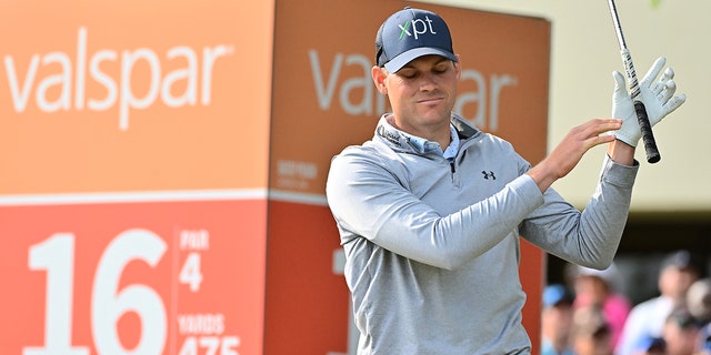 Adam Schenk of the United States reacts on the 16th tee during the final round of the Valspar Championship at Innisbrook Resort and Golf Club on March 19, 2023 in Palm Harbor, Florida.