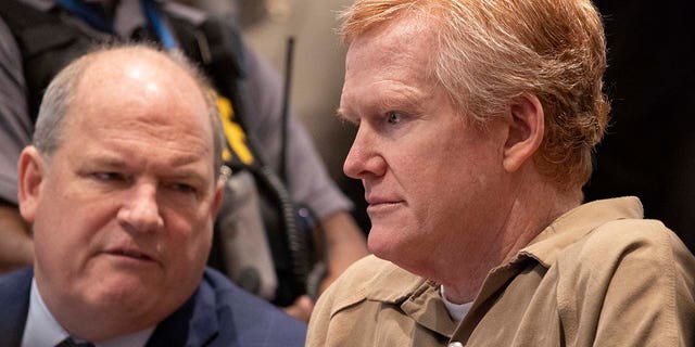 Alex Murdaugh and his defense attorney Jim Griffin talk before his sentencing at the Colleton County Courthouse in Walterboro, South Carolina, on Friday, March 3, 2023 after he was found guilty of murdering his wife and son.