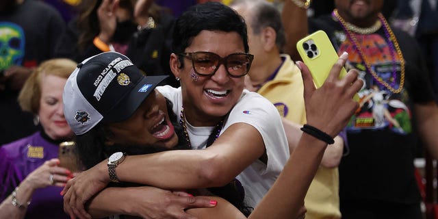 Angel Reese, #10 of the LSU Lady Tigers, celebrates after defeating the Miami Hurricanes 54-42 in the Elite Eight round of the NCAA Women's Basketball Tournament at Bon Secours Wellness Arena on March 26, 2023 in Greenville, South Carolina.