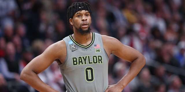 Flo Thamba #0 of the Baylor Bears looks on during the second half against the Creighton Bluejays in the second round of the NCAA Men's Basketball Tournament at Ball Arena on March 19, 2023 in Denver, Colorado.