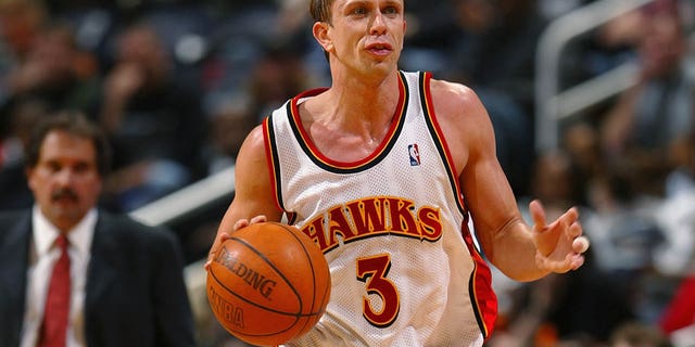 Bob Sura, #3 of the Miami Heat, dribbles the ball up the court against the Atlanta Hawks during the game at Philips Arena on March 31, 2004 in Atlanta.