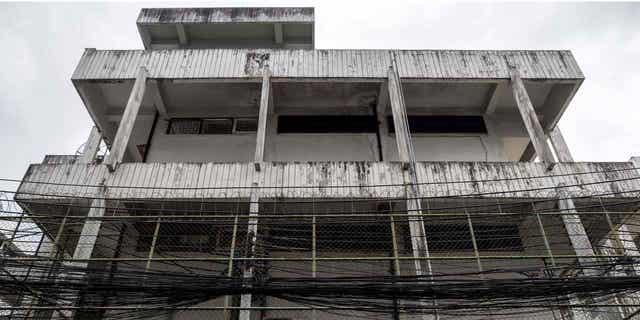 In this photo taken on September 30, 2022, an immigration detention center, where human rights activists believe that a group of Uyghurs are being detained, is pictured in the Sathorn area of Bangkok. Almost a decade after fleeing from China, more than 50 Uyghurs are languishing in Thai immigration centers facing an uncertain future as the kingdom strives to strike a balance between Beijing and Washington. (Photo by JACK TAYLOR/AFP via Getty Images)