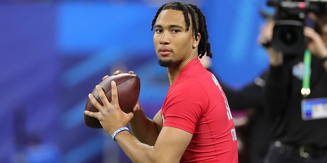 CJ Stroud of Ohio State participates in a drill during the NFL Combine at Lucas Oil Stadium on March 04, 2023 in Indianapolis, Indiana.