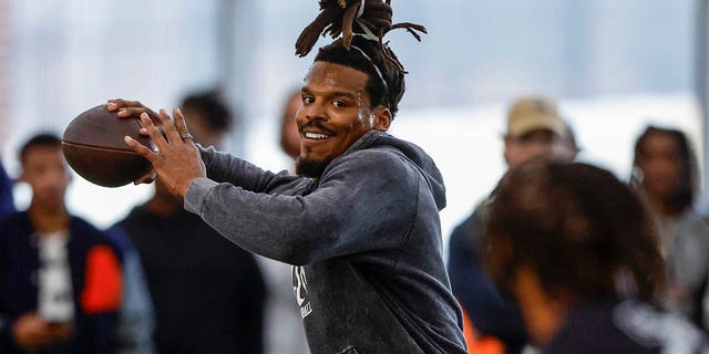 Cam Newton, throws a pass during Auburn pro day, Tuesday, March 21, 2023.