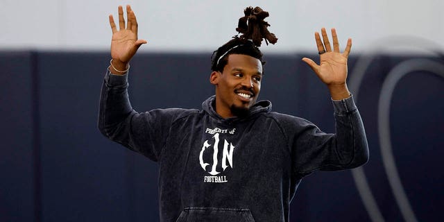 Cam Newton, warms up during Auburn pro day, Tuesday, March 21, 2023, in Alabama.