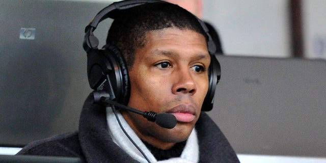 Carlton Palmer working for the radio commentating on the game.