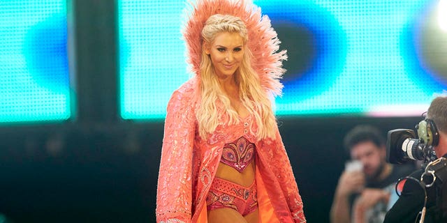 WWE superstar Charlotte Flair approaches the ring during event at Barclays Center in Brooklyn, New York.