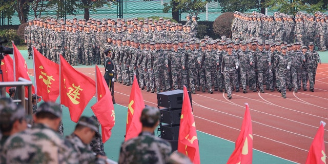 Freshmen take part in a military training at Southeast University Oct. 22, 2021, in Nanjing, Jiangsu Province of China.