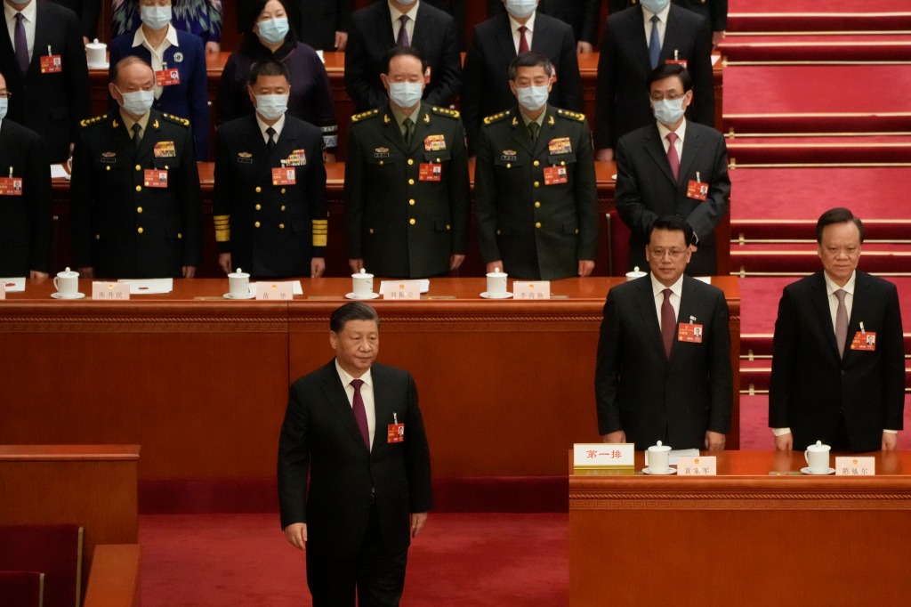 Chinese President Xi Jinping walks to take his oath after he is unanimously elected as President in Beijing, on March 10, 2023.