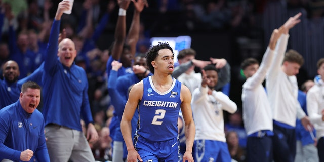 Ryan Nembhard #2 of the Creighton Bluejays reacts after a three point basket during the second half against the Baylor Bears in the second round of the NCAA Men's Basketball Tournament at Ball Arena on March 19, 2023 in Denver, Colorado.