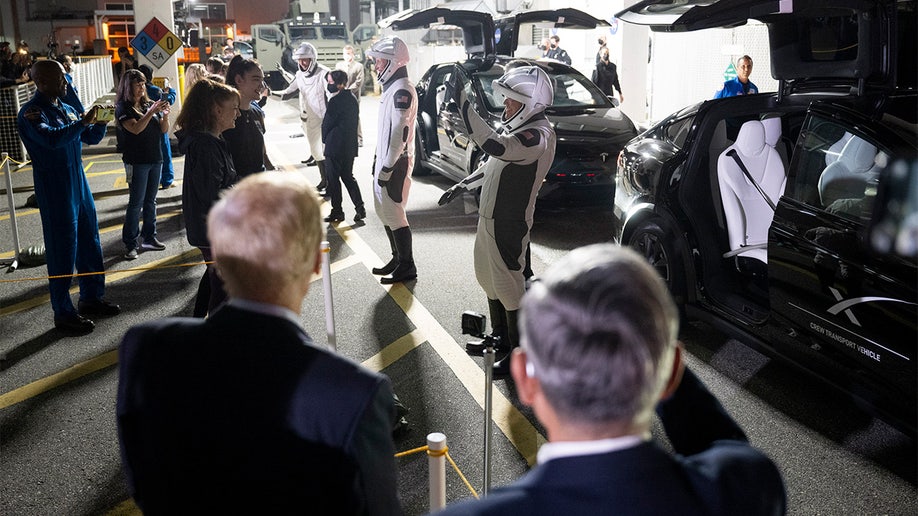 NASA administrators see the astronauts off before launch