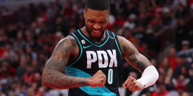 Damian Lillard #0 of the Portland Trail Blazers celebrates a basket against the Chicago Bulls during the first half at United Center on February 04, 2023 in Chicago, Illinois.