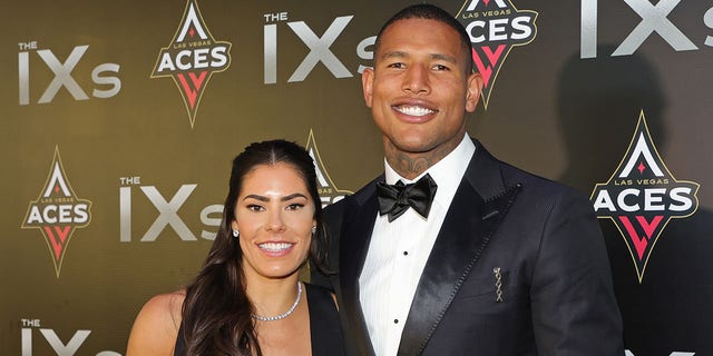 WNBA player Kelsey Plum (L) of the Las Vegas Aces and tight end Darren Waller of the Las Vegas Raiders attend the inaugural IX Awards at Allegiant Stadium on June 17, 2022 in Las Vegas, Nevada. 