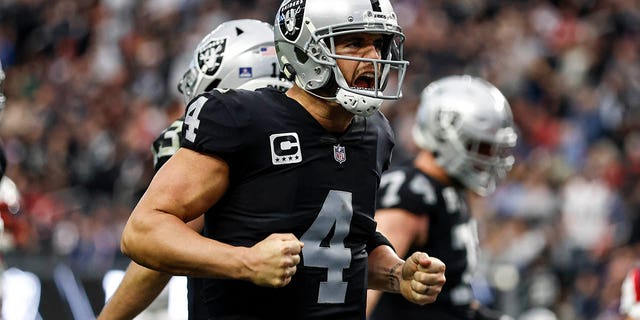 Derek Carr, #4 of the Las Vegas Raiders, celebrates after throwing for a touchdown during an NFL football game between the Las Vegas Raiders and the New England Patriots at Allegiant Stadium on Dec. 18, 2022 in Las Vegas.