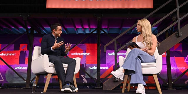 David Ornstein of The Athletic and Emma Jones during Web Summit 2022 at the Altice Arena in Lisbon, Portugal.