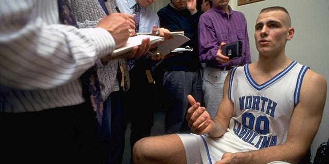 North Carolina's Eric Montross is interviewed by media after the Wake Forest game at Dean Smith Center.