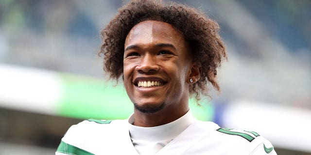 Garrett Wilson, #17 of the New York Jets, looks on before the game against the Seattle Seahawks at Lumen Field on Jan. 1, 2023 in Seattle.