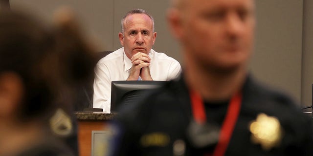 Sacramento Mayor Darrell Steinberg looks on as activists disrupt a Sacramento City Council meeting on March 5, 2019 in Sacramento, Calif.