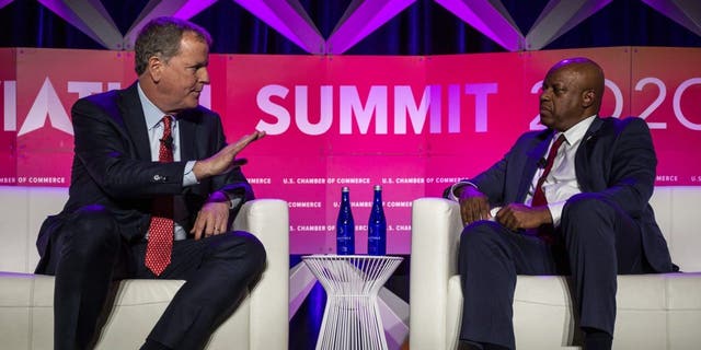 Doug Parker, chairman and chief executive officer of American Airlines Group Inc., left, speaks to Rick Wade, vice president of strategic alliances and outreach at the U.S. Chamber of Commerce, at the U.S. Chamber of Commerce Aviation Summit in Washington, D.C., U.S., on Thursday, March 5, 2020. Photographer: Zach Gibson/Bloomberg via Getty Images