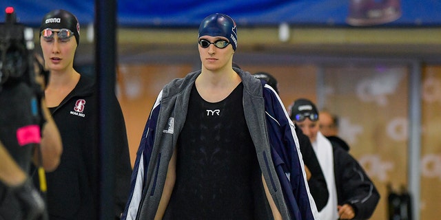 University of Pennsylvania swimmer Lia Thomas, center, enters for the 200 Freestyle final during the NCAA Swimming and Diving Championships on March 18th, 2022 at the McAuley Aquatic Center in Atlanta.