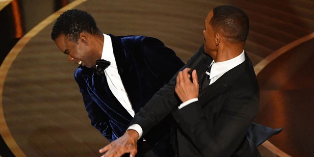 Will Smith, right, took issue with Chris Rock's joke about his wife, Jada Pinkett Smith, leading him to slap the comedian across the face.