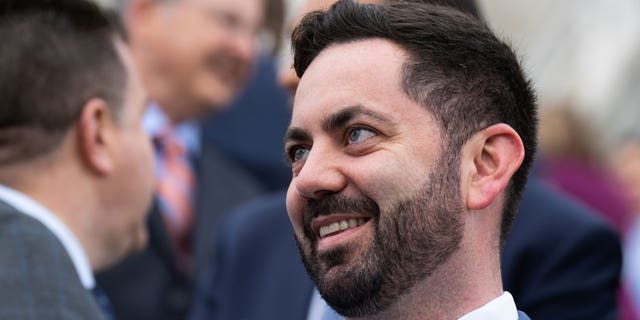 Then-Rep.-elect Mike Lawler, R-N.Y., chats with other newly elected member of Congress as they gather for the 118th Congress member-elect class photo on the House steps of the U.S. Capitol in Washington on Tuesday, November 15, 2022.