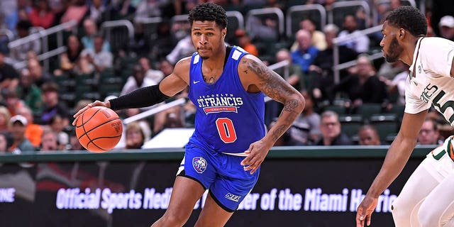 St. Francis guard Tedrick Wilcox Jr. drives against the Miami Hurricanes on Nov. 23, 2022, at the Watsco Center in Coral Gables, Florida.