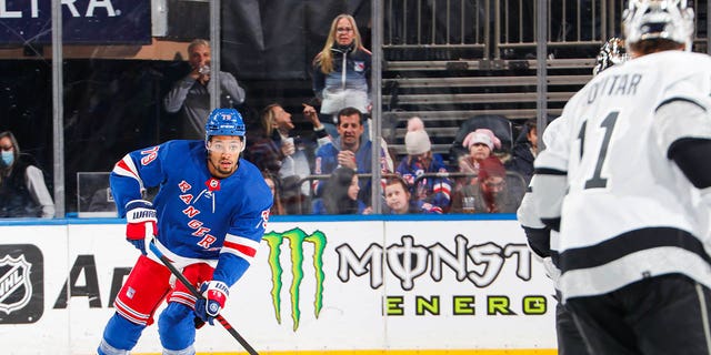 K'Andre Miller, #79 of the New York Rangers, skates with the puck against the Los Angeles Kings at Madison Square Garden on Feb. 26, 2023 in New York City. 