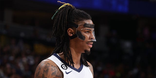 Ja Morant #12 of the Memphis Grizzlies looks on during the game against the Denver Nuggets on March 3, 2023 at the Ball Arena in Denver, Colorado. 