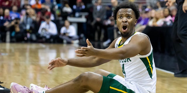 Baylor guard LJ Cryer (4) reacts after losing possession of the ball during the Big12 Tournament game between the Baylor Bears and the Iowa State Cyclones on Thursday March 9, 2023 at the T-Mobile Center in Kansas City, Mo.