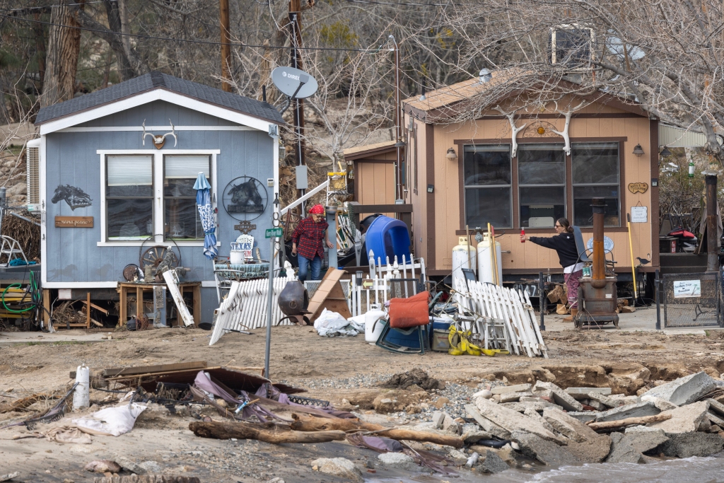 Damaged trailer homes are seen in the aftermath of a flood caused by rain-melted snow on March 12, 2023 in Kernville. 