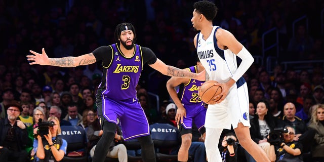 Anthony Davis (3) of the Los Angeles Lakers defends during a game against the Dallas Mavericks March 17, 2023, at Crypto.Com Arena in Los Angeles.