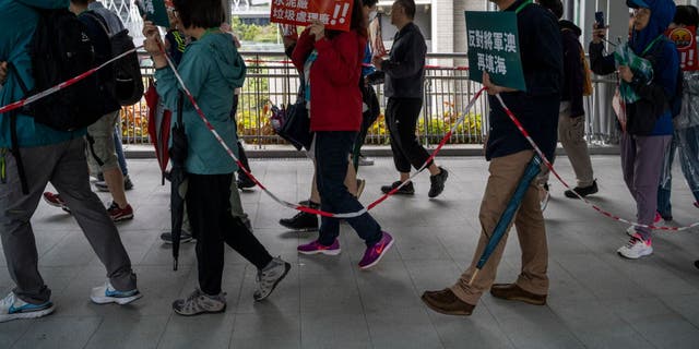 Protesters had to remain within police boundaries as they walked through Hong Kong.