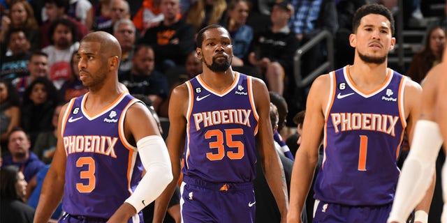 Kevin Durant, center, of the Suns during the Minnesota Timberwolves game on March 29, 2023, at Footprint Center in Phoenix, Arizona.