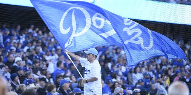 Los Angeles Dodgers fans look on prior to an Opening Day baseball game between the Los Angeles Dodgers and the Arizona Diamondbacks at Dodger Stadium in Los Angeles on Thursday, March 30, 2023.