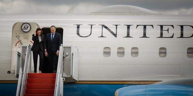 Vice President Kamala Harris and second gentleman Doug Emhoff disembark from Air Force Two at Kenneth Kuanda International Airport in Lusaka, Zambia, on Friday.