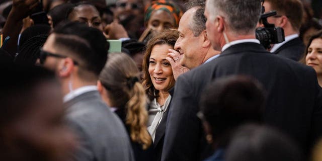 Vice President Kamala Harris and second gentleman Doug Emhoff arrive at Kenneth Kuanda International Airport in Lusaka, Zambia, on Friday.