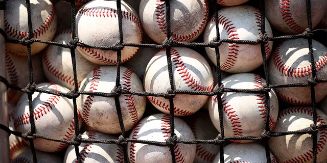 The Ole Miss Rebels prepare to take on the Oklahoma Sooners during the Division I Men's Baseball Championship held at Charles Schwab Field Omaha on June 25, 2022 in Omaha, Nebraska.